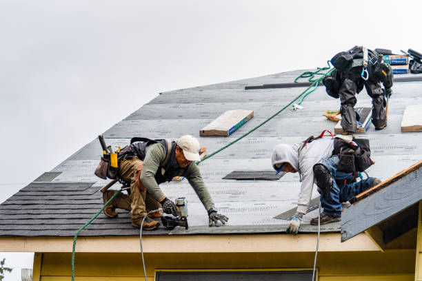 Professional Storm Damage Roof Repair technician working in York Beach, ME